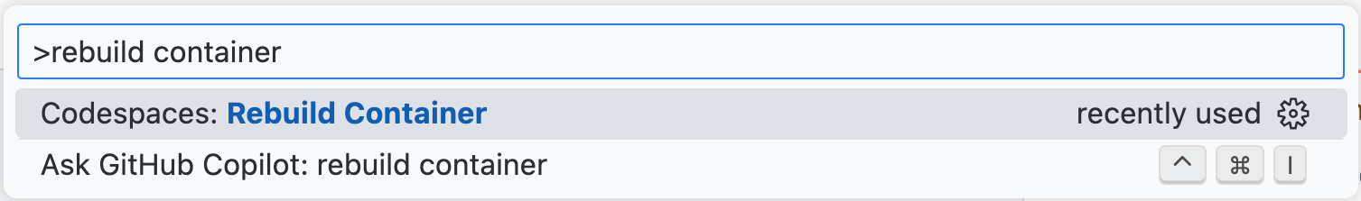 "rebuild container" が検索され、ドロップダウンで [Codespace: Rebuild Container] オプションが強調されている、コマンド パレットのスクリーンショット。