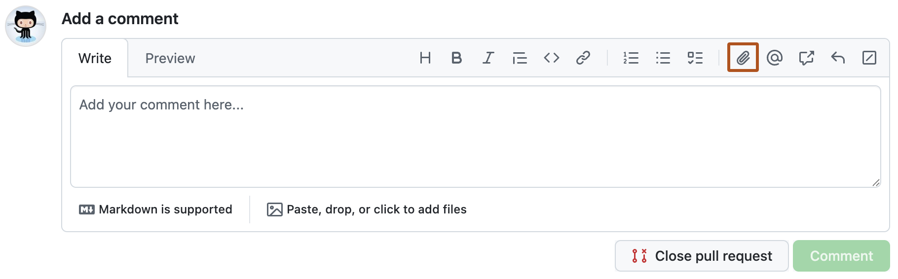 拉取请求注释框的屏幕截图。 “附加文件”图标以橙色边框显示。